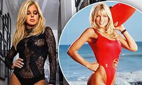 Baywatch star Donna D’Errico, 51, shows off figure in black leotard… after having an arm lift, liposuction and tummy tuck in 2017